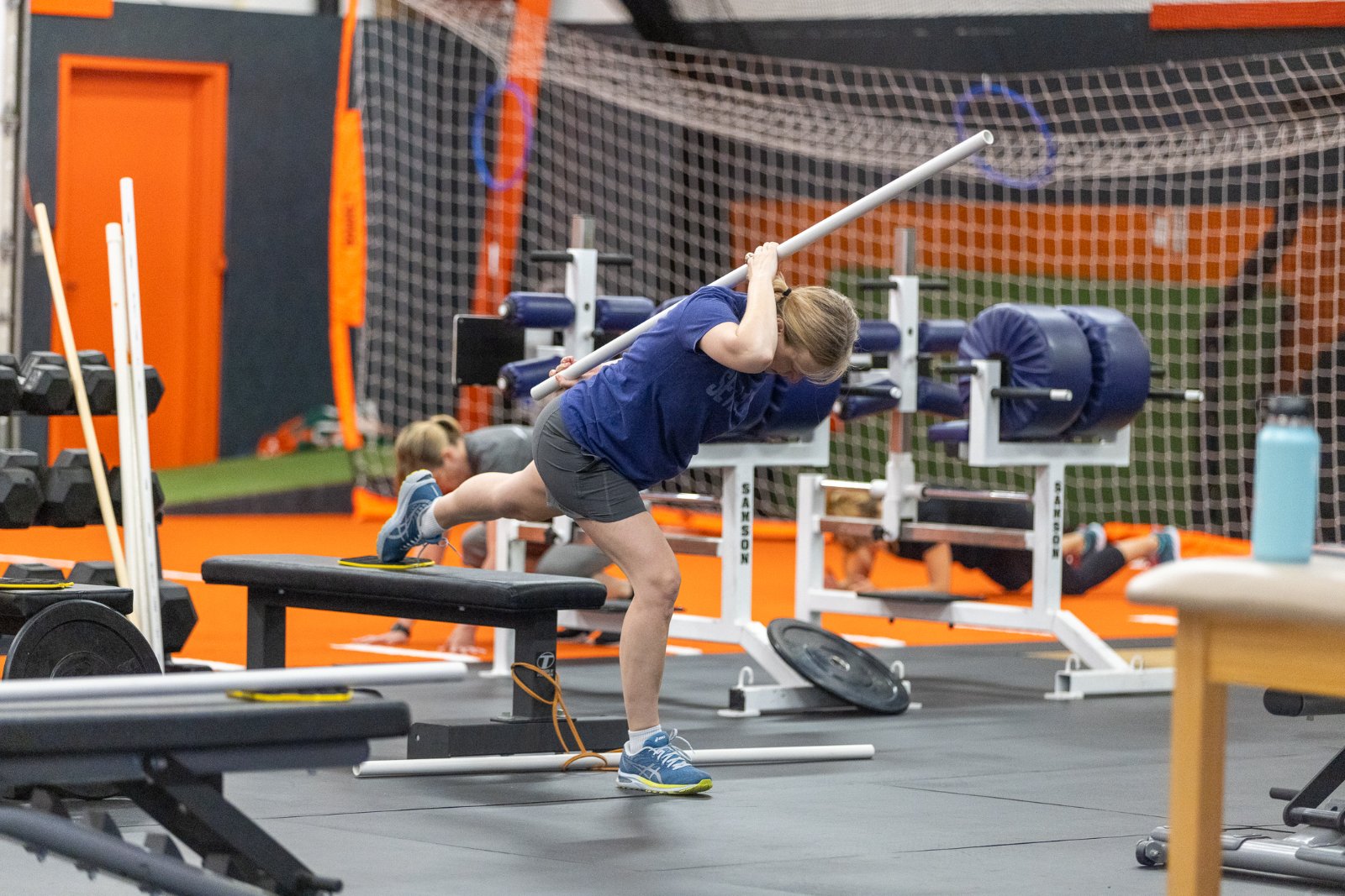 Adult athlete training a hinge pattern