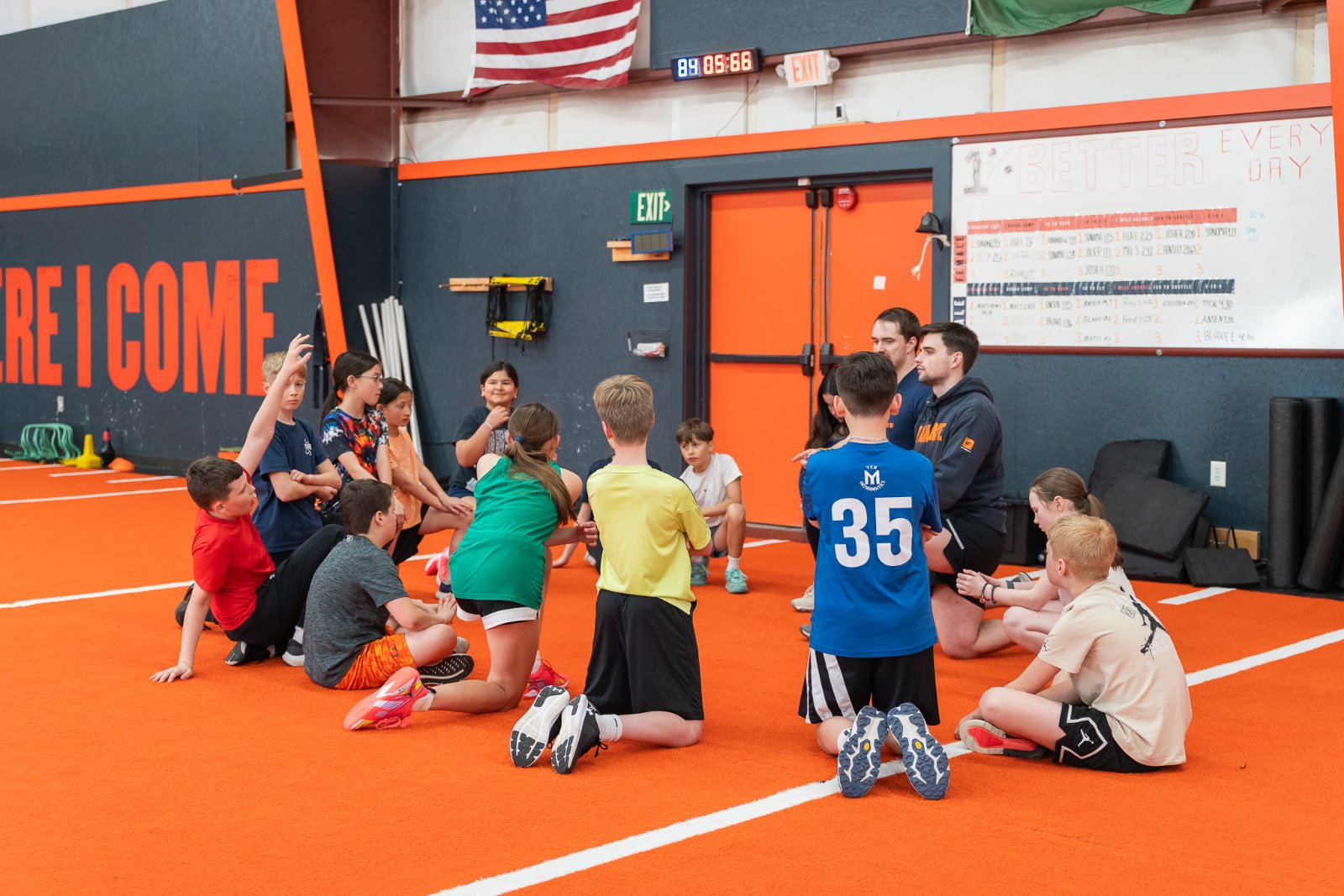 Junior Grit coaching huddle